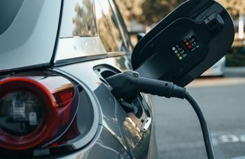 Car at EV charging point